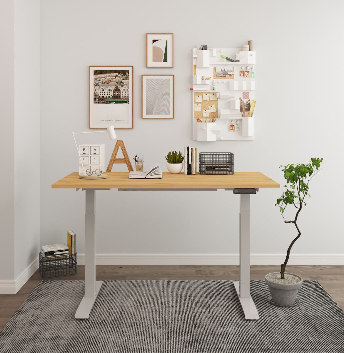 An adjustable desk with a wooden top and desk accessories